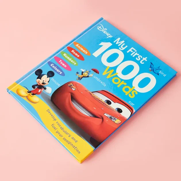 Cover of Disney My First 1000 Words showing colorful Disney character scenes